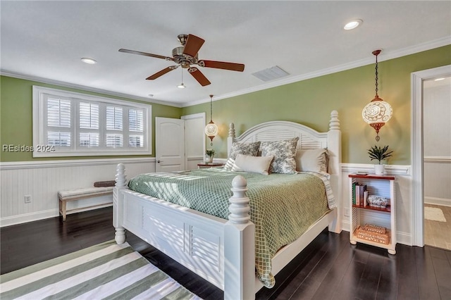 bedroom featuring crown molding, ceiling fan, and dark hardwood / wood-style floors