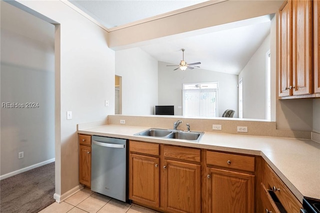 kitchen with vaulted ceiling, appliances with stainless steel finishes, sink, light tile patterned floors, and ceiling fan