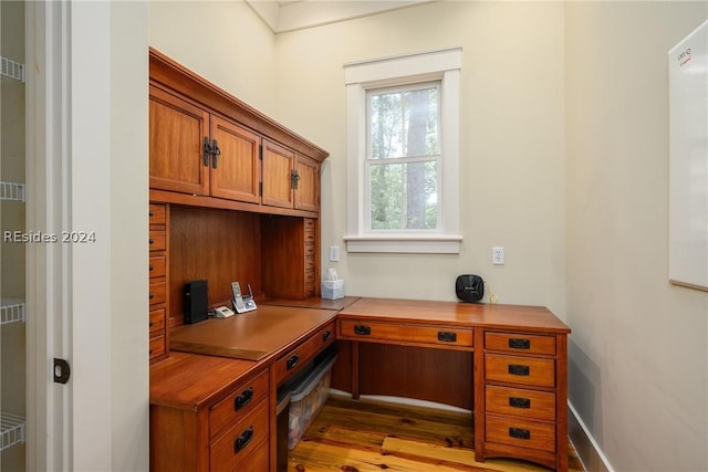 office space with light hardwood / wood-style floors