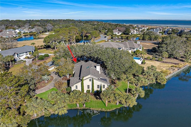 bird's eye view with a water view