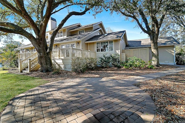 view of front of home with a deck