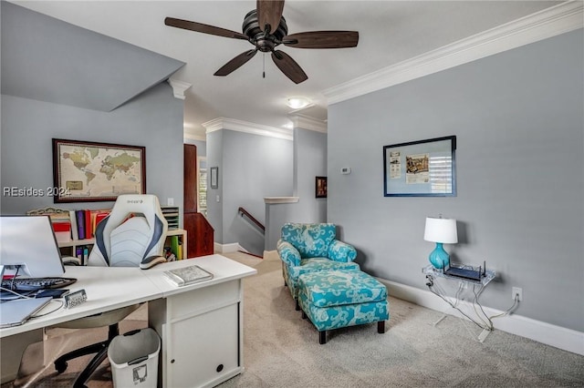 office with crown molding, ceiling fan, and light carpet