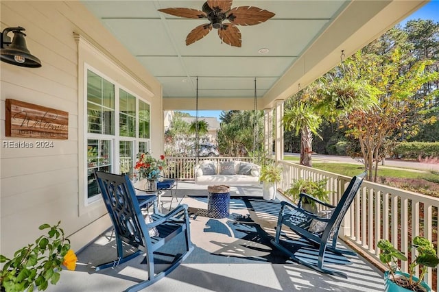 exterior space featuring ceiling fan