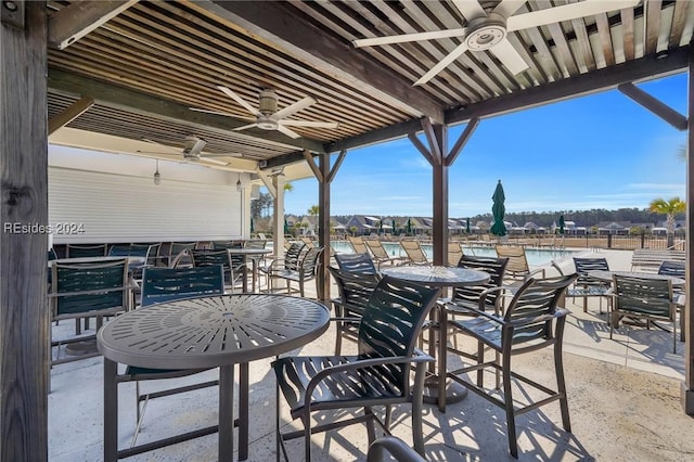 view of patio / terrace featuring ceiling fan