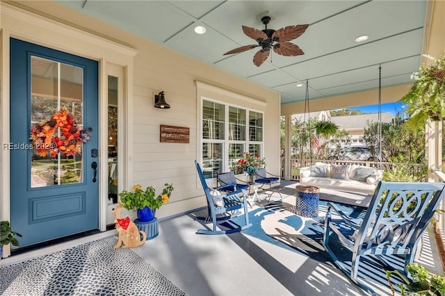 view of patio featuring an outdoor hangout area and ceiling fan