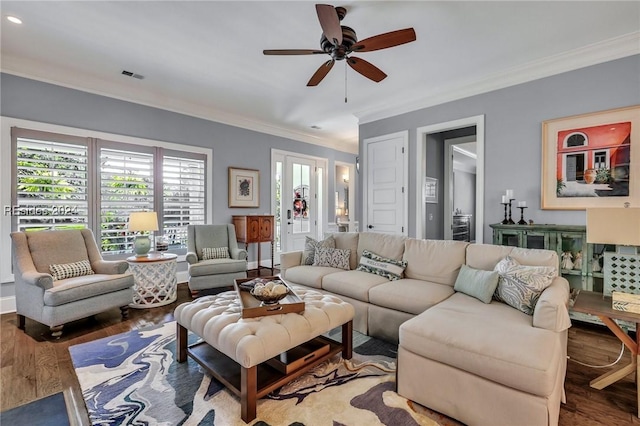 living room featuring crown molding, ceiling fan, and hardwood / wood-style floors