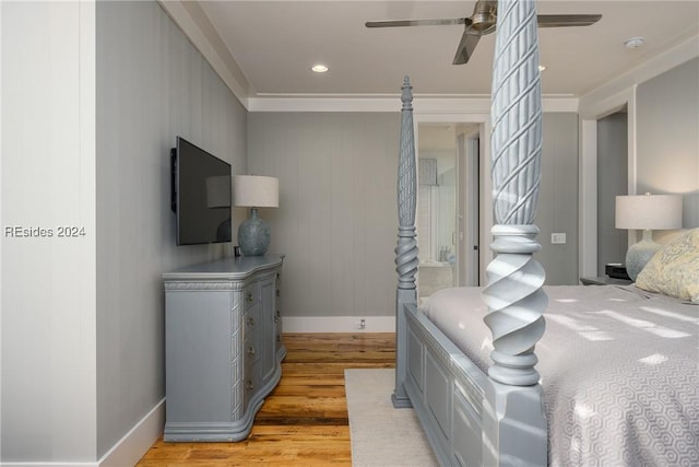 bedroom featuring ceiling fan, ornamental molding, and light hardwood / wood-style floors