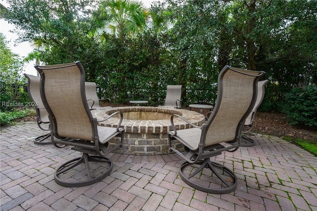 view of patio / terrace with a fire pit