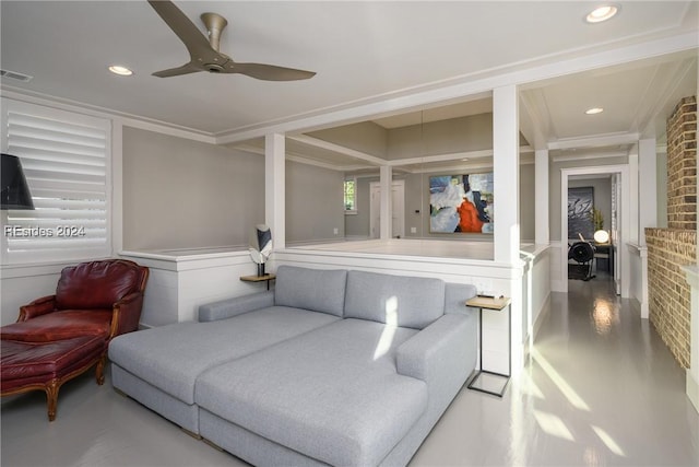 sitting room with crown molding, ceiling fan, and concrete flooring