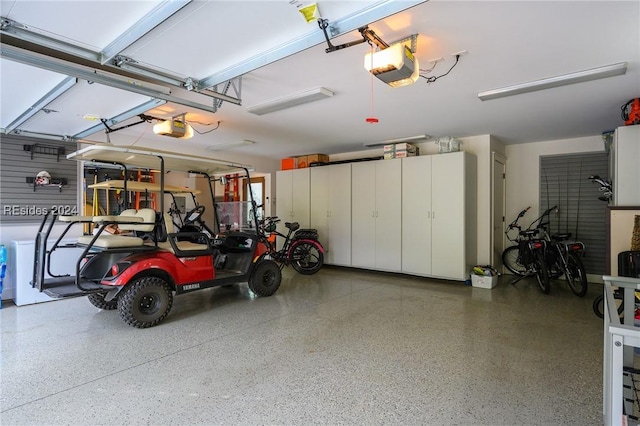 garage featuring a garage door opener