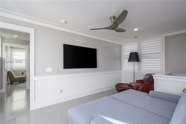 bedroom with ceiling fan and ornamental molding