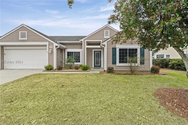 ranch-style home featuring a garage and a front lawn