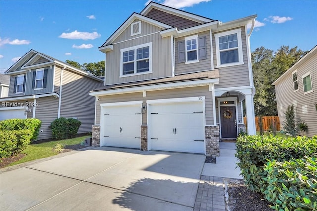 craftsman inspired home with a garage