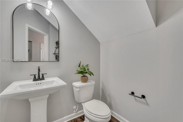 bathroom featuring sink and toilet