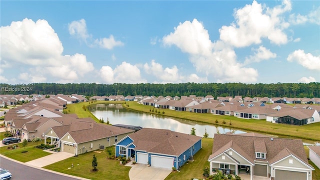 drone / aerial view with a water view