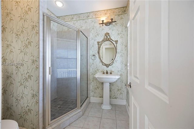 bathroom featuring walk in shower and tile patterned flooring