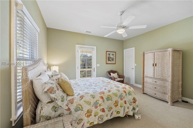 bedroom with carpet flooring, access to exterior, and ceiling fan