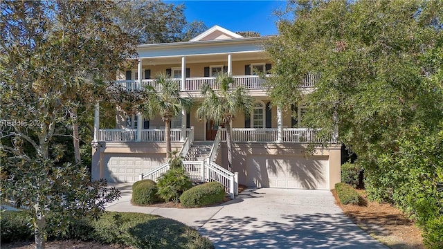 view of front of home featuring a garage and covered porch