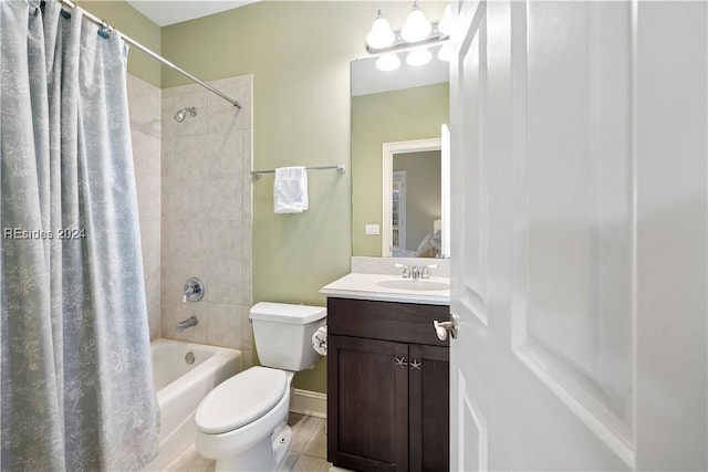 full bathroom featuring vanity, shower / tub combo, and toilet