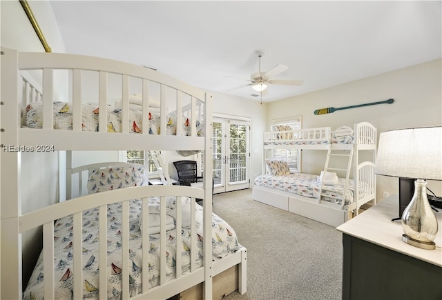 bedroom featuring carpet floors, ceiling fan, and french doors