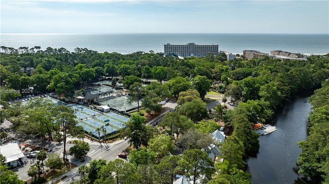 birds eye view of property with a water view