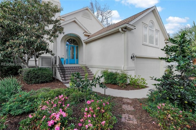 view of front of house with a garage