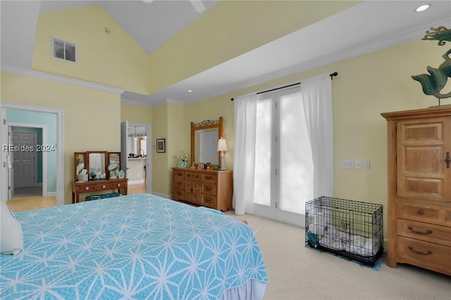 bedroom with multiple windows, crown molding, carpet floors, and ensuite bathroom