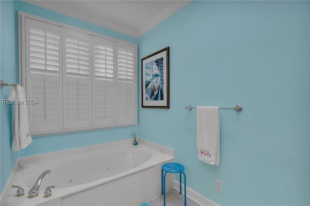 bathroom featuring a tub to relax in and ornamental molding