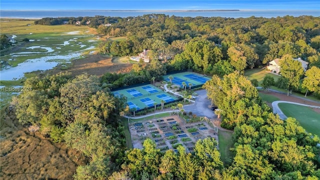 birds eye view of property with a water view