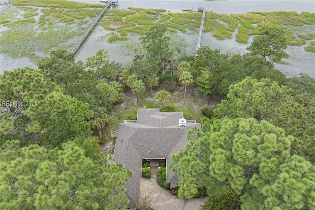 birds eye view of property featuring a water view