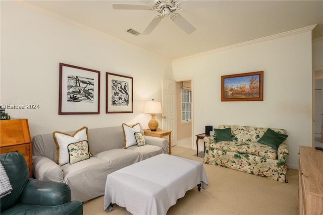 carpeted bedroom with crown molding and ceiling fan