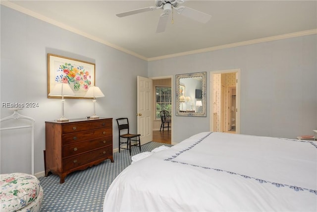 bedroom with crown molding, ceiling fan, and ensuite bathroom