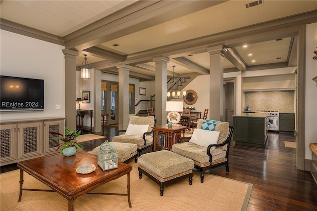 living room featuring decorative columns, ornamental molding, dark hardwood / wood-style flooring, and beamed ceiling