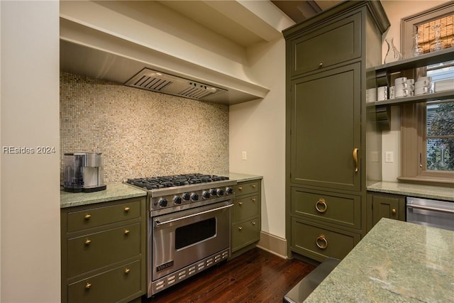 kitchen featuring tasteful backsplash, luxury range, dark hardwood / wood-style floors, and light stone counters