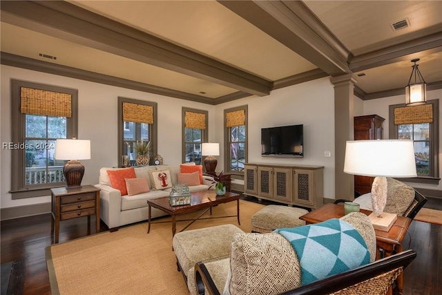 living room with hardwood / wood-style floors, ornamental molding, decorative columns, and beamed ceiling