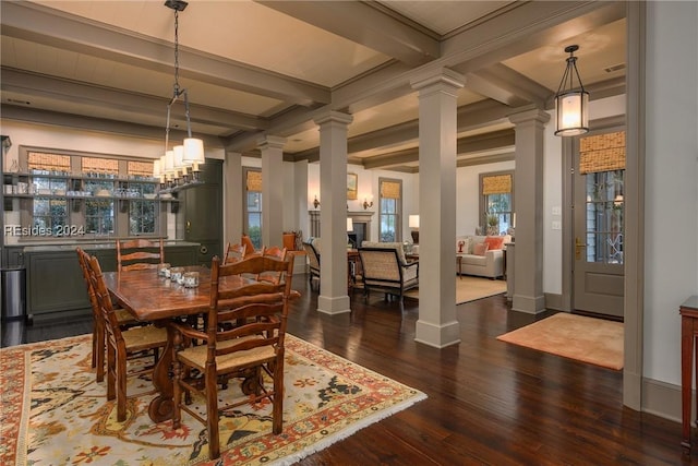 dining space with beamed ceiling, dark hardwood / wood-style flooring, and decorative columns