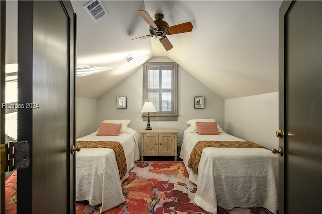 bedroom featuring ceiling fan and vaulted ceiling