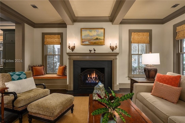 living area featuring wood-type flooring, crown molding, and beam ceiling