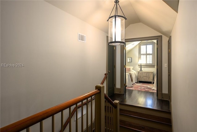 stairs with lofted ceiling