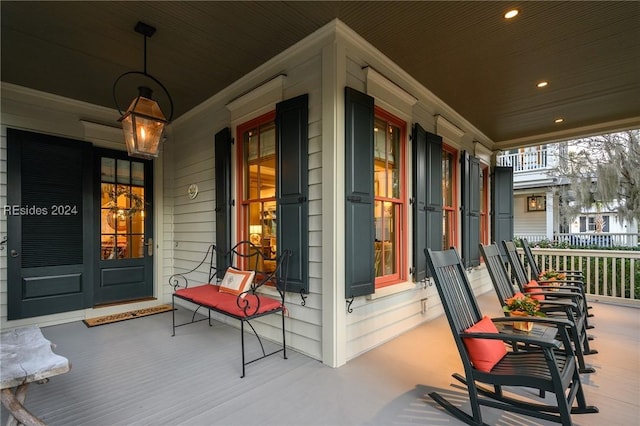 wooden deck with a porch