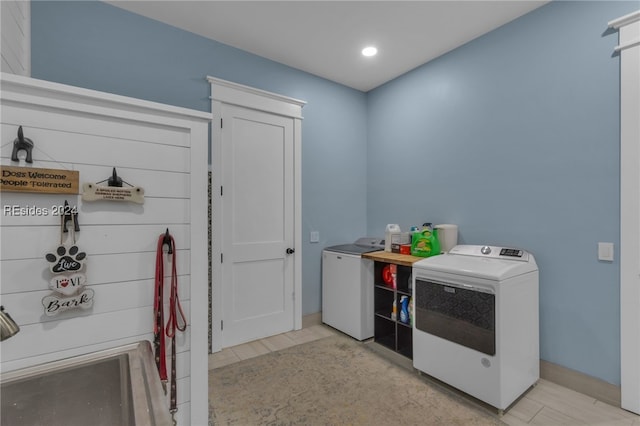 washroom featuring separate washer and dryer