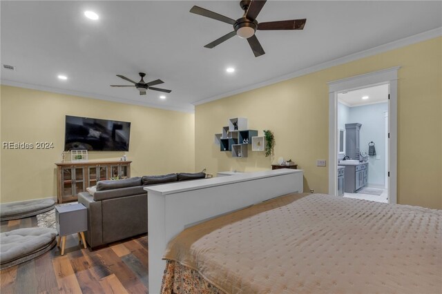 bedroom featuring dark hardwood / wood-style flooring, connected bathroom, ornamental molding, and ceiling fan