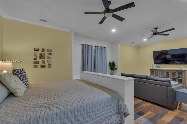 bedroom featuring dark wood-type flooring, ceiling fan, and ornamental molding