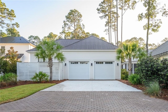 view of front of property with a garage