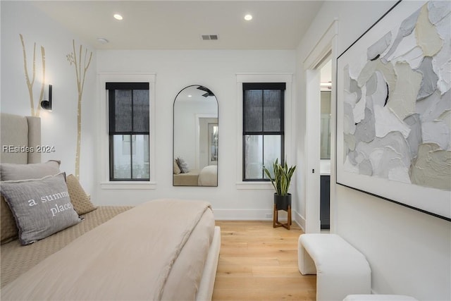 bedroom with light hardwood / wood-style floors