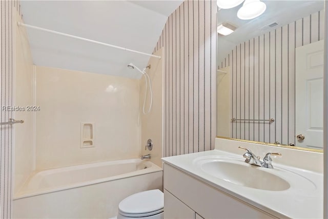 full bathroom with  shower combination, toilet, and vanity