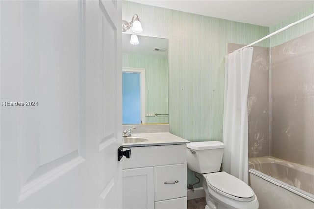 full bathroom with vanity, toilet, and shower / bath combo