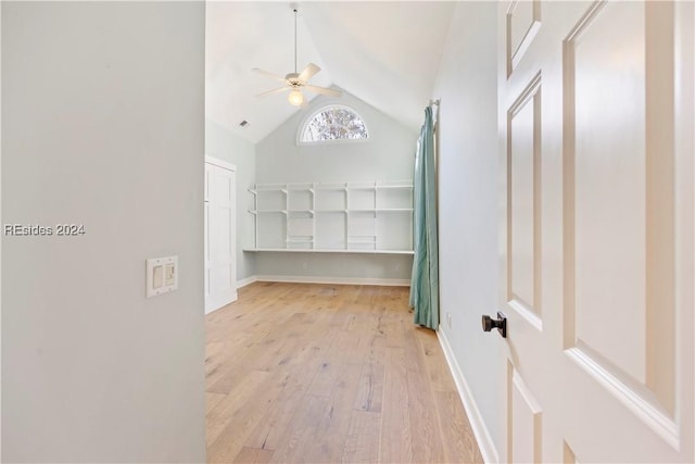 interior space with vaulted ceiling, light hardwood / wood-style floors, and ceiling fan