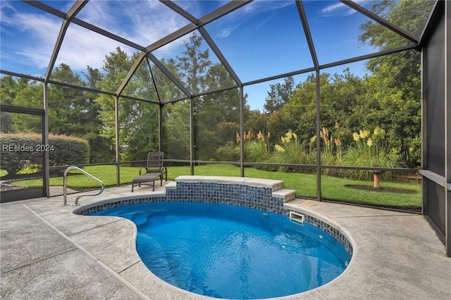 view of swimming pool with a lawn, glass enclosure, and a patio area