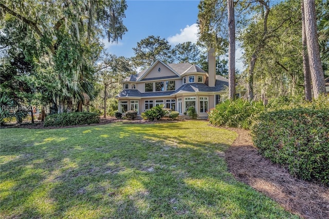 view of front of home with a front lawn